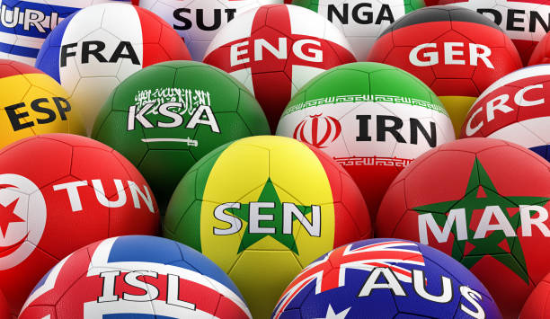 istock soccer balls colored in different national flag colors - 3D rendering 959198078