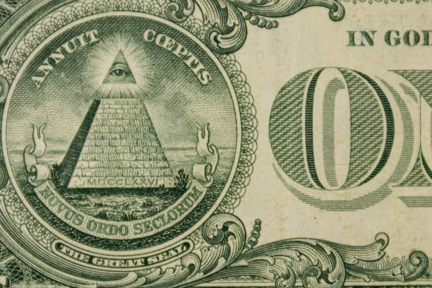 Conceptual image of mountain of cash and blue sky