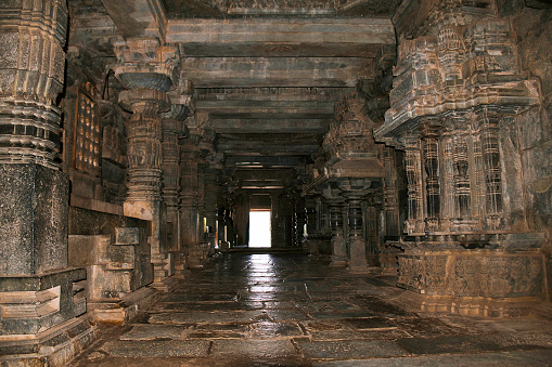 Long passage covered with various kinds of pillars adjoining both, the Shantaleshwara and Hoysaleshvara shrine, Hoysaleshvara Temple, Halebid, Karnataka, india.