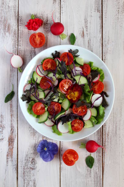 istock Fresh salad with tomato and vegetables. 959210088