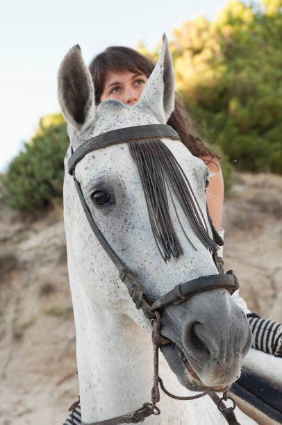 istock woman on horseback 959212206