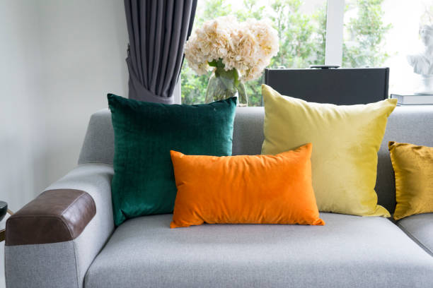 istock living room with grey sofa and colorful pillows 959212240