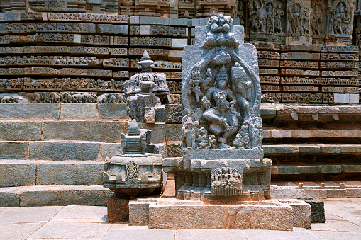 Sulpture of dancing Shiva. Kedareshwara Temple, Halebid, Karnataka, india.