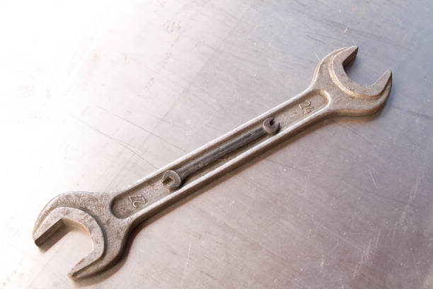 istock Large and small wrenches on metal table. Father's day. Labor day 959213038