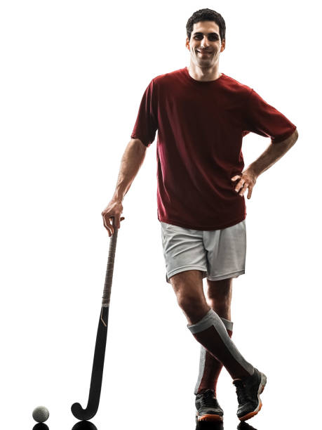 istock field hockey player man isolated silhouette white background 959219562