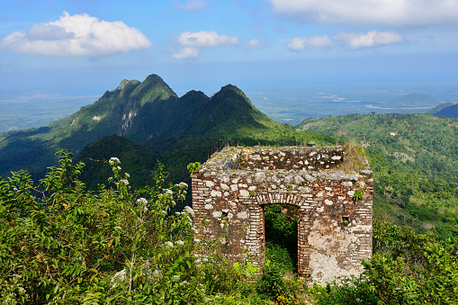 Mountain range over Haiti and remains of the French Citadelle la ferriere built on the top of a mountain\