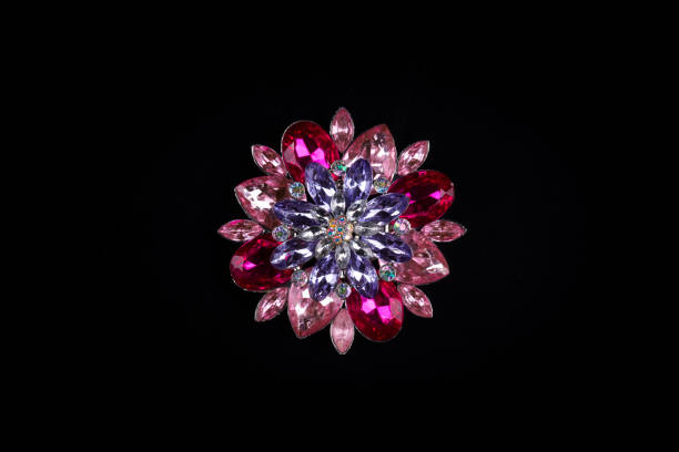 istock expensive brooch with precious stones on a black background 959223128