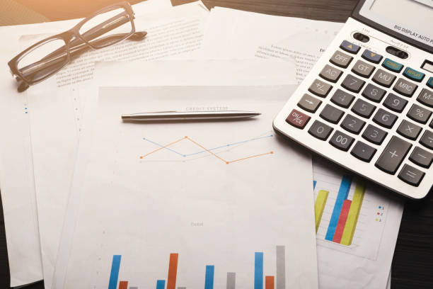 istock Calculator and business charts with credit system 959223750