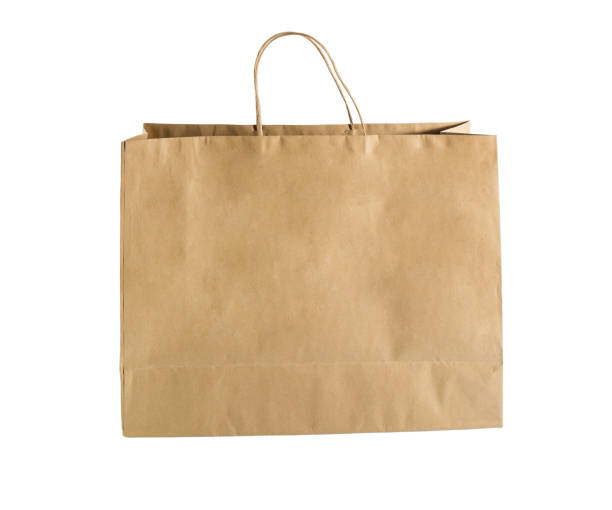 istock Brown paper shopping bags isolated on white background with clipping path. 959227004
