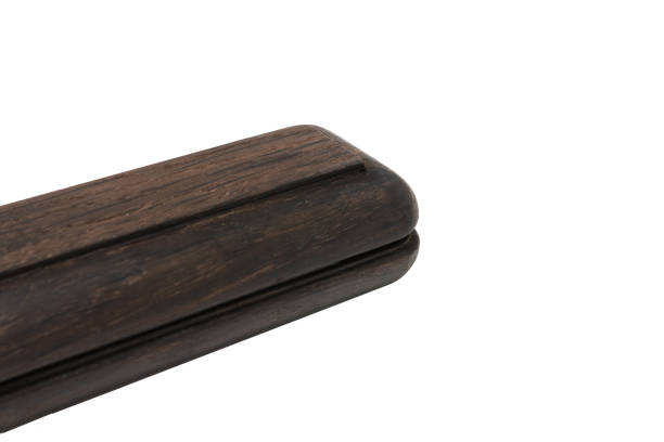 istock A pencil case for a ballpoint pen made from old oak on a white background 959238974