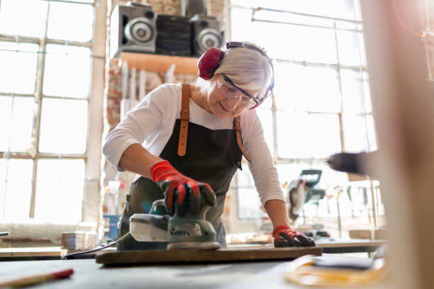 istock Senior woman doing woodwork in a workshop 959244342
