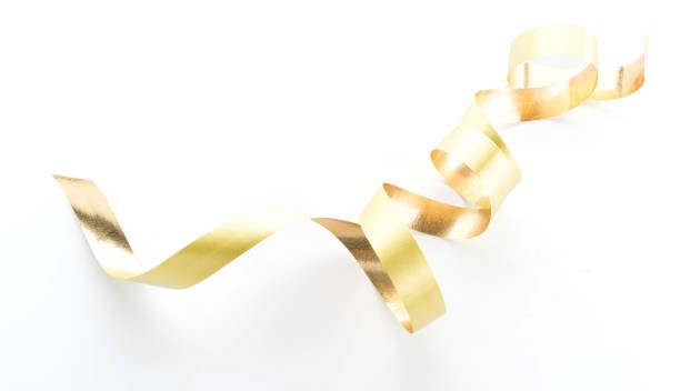 istock Golden ribbon roll isolated on white background 959248478