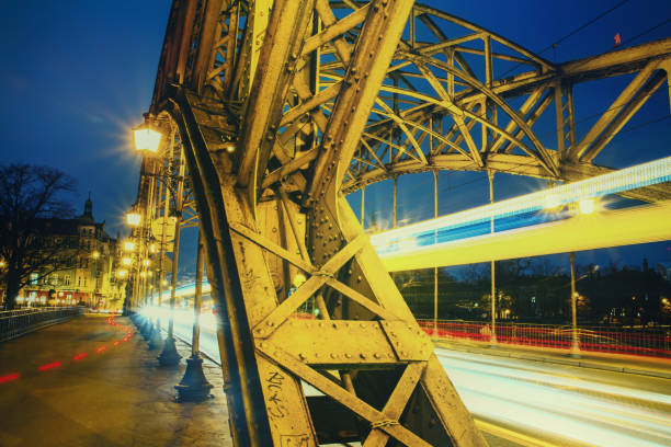 Cityscape - evening view on bridge with lights moving vehicles, the Zwierzyniecki Bridge eastern part of Wroclaw, Poland