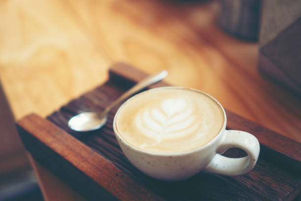 istock Cup of coffee latte in coffee shop 959252168