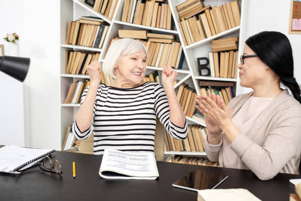 istock Cheerful mature woman finishing lesson 959252518