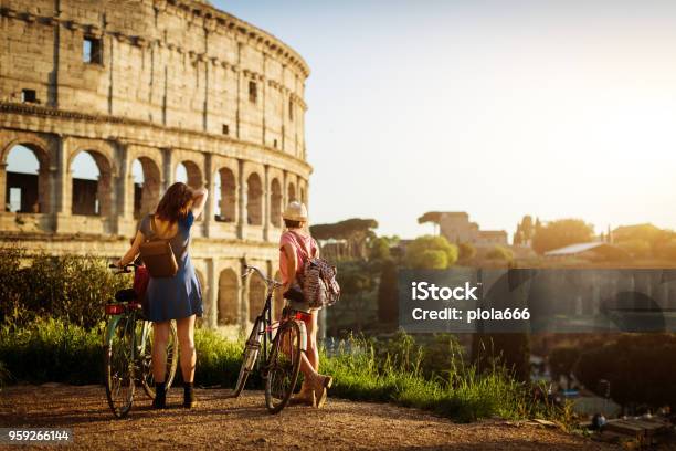 Tourist Women In Rome By The Coliseum Stock Photo - Download Image Now - Rome - Italy, Italy, Tourist