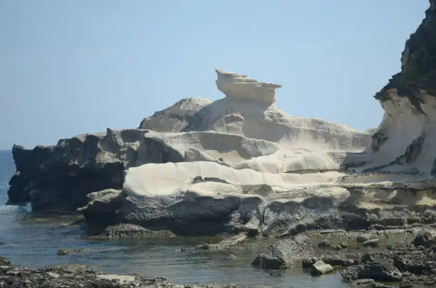 Kapurpurawan Rock Formation in Burgos, Ilocos Norte, Philippines. A white rock destination.