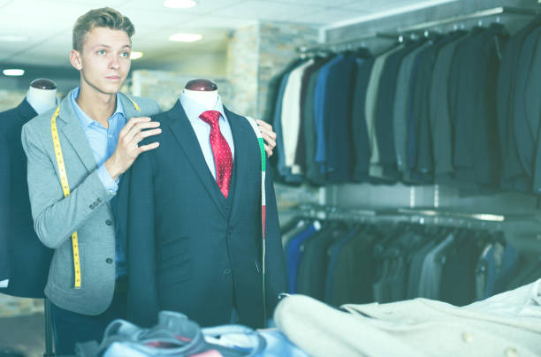 istock man seller measuring business style jacket 959270120