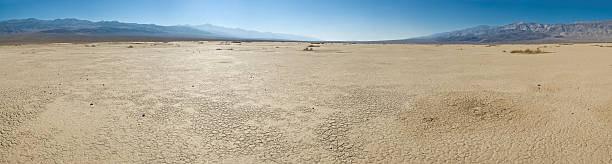 A dry lakebed in the desert surrounded by mountains.file_thumbview_approve.php?size=1&id=5923018
