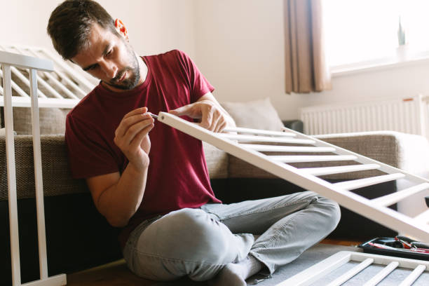 istock Preparing the crib for new family member 959278048