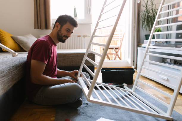 istock Preparing the crib for new family member 959282710