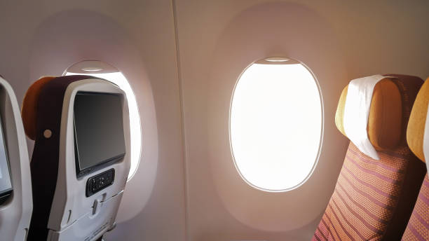 istock window of the passenger plane and empty seats 959286520