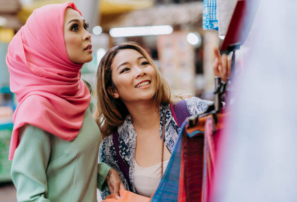 istock Two friends having shopping at the bazaar 959286900