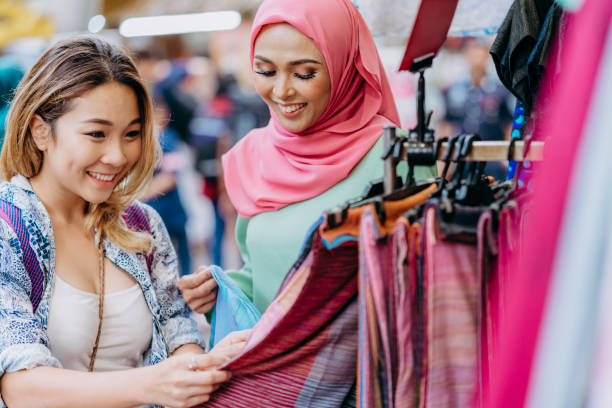 istock Two friends having shopping at the bazaar 959286902