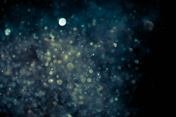 istock Christmas blur bokeh background texture abstract light glittering stars on bokeh. glitter vintage lights background 959289502