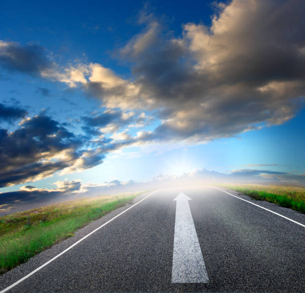 istock Arrow Painted On Road Pointing To The Future 959293074