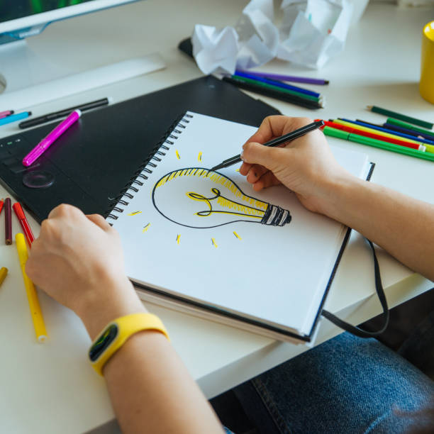istock woman designer working at home. workplace. ideas 959293170