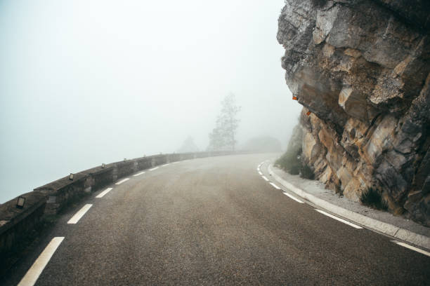istock Mountain road with curves 959296756