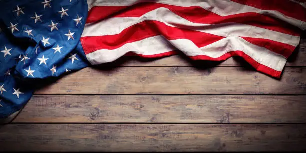 Aged Usa Flag On Wooden Plank