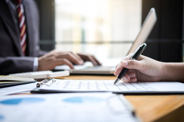 istock Business team meeting working with new startup project, discussion and analysis data the charts and graphs. Digital tablet calculator, laptop computer using, Business finances and accounting concept 959307974