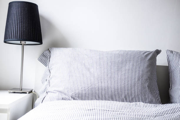 istock White gray minimalist bedroom design 959308728