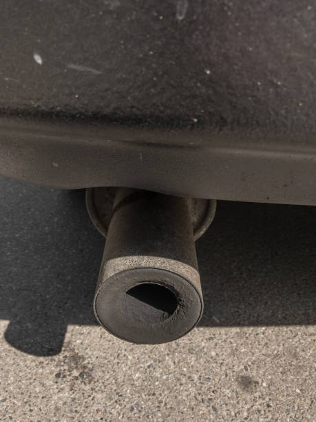 istock Dirty exhaust system of the old car 959312098