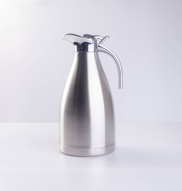 istock Thermo or Thermo flask from stainless stee on background 959312780