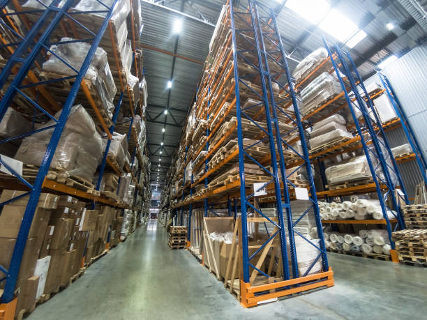 istock Logistics concept. Huge industrial warehouse, business shipping and cargo storage for export, pallets with goods on shelves, perspective 959312856