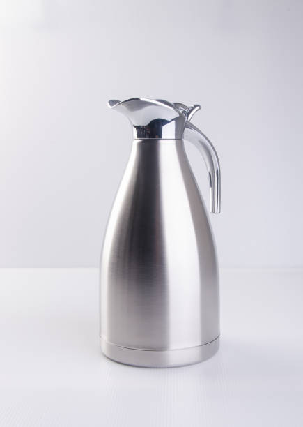 istock Thermo or Thermo flask from stainless stee on background 959313444