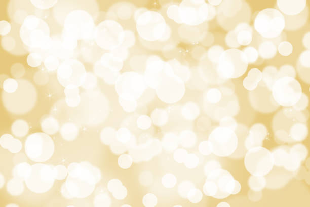 istock Abstract illustration bokeh light on golden background 959319756