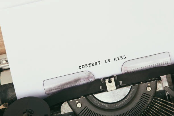 Content is king Content is king typed on vintage typewriter typewriter keyboard communication text office stock pictures, royalty-free photos & images