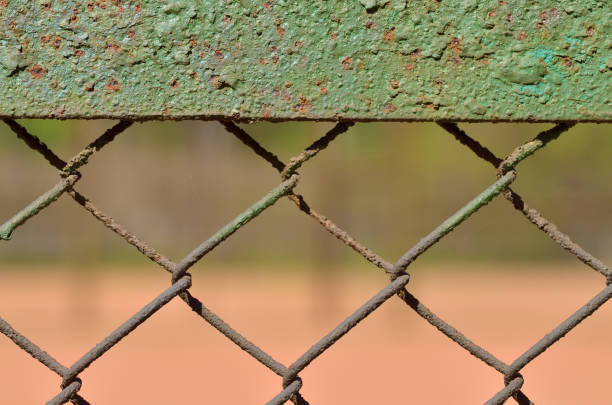 istock A fence made of iron net. 959327878