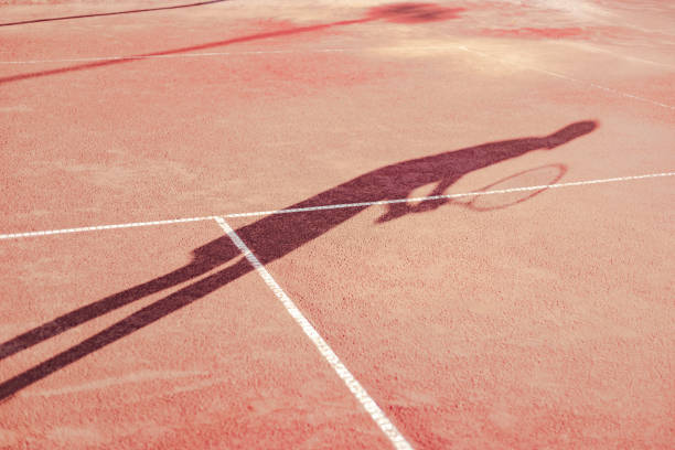 istock Shadow of a tennis player 959331834