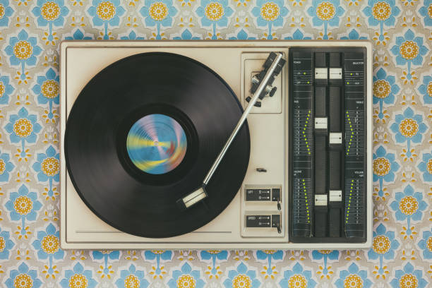 istock Record player on top of flower wallpaper 959331870