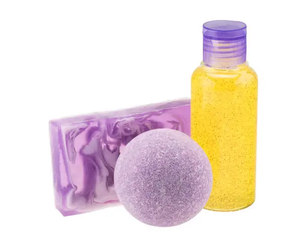 Purple bath bomb, handmade soap and cosmetic bottle