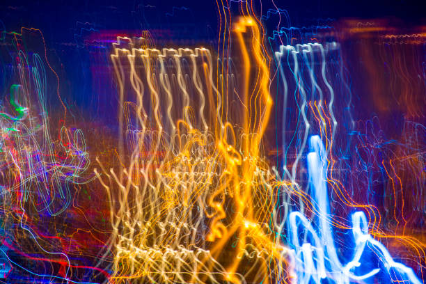 istock Abstract experimental surreal photo , long exposure, city and vehicle lights.Quantum physics and lines of light particles photons 959337150