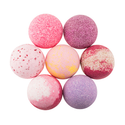 Composition of variegated bath bombs isolated over white