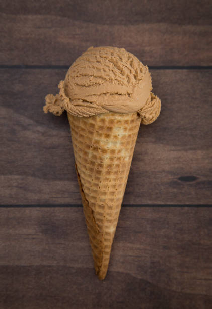 istock Coffee Flavored Ice Cream in a Waffle Cone 959340008