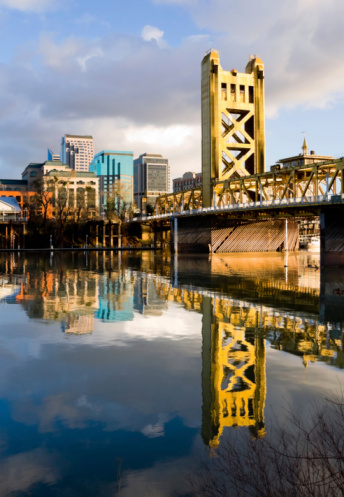 Modern buildings and downtown city skyline view of the Congress Avenue bridge over the Colorado River in Austin Texas USA