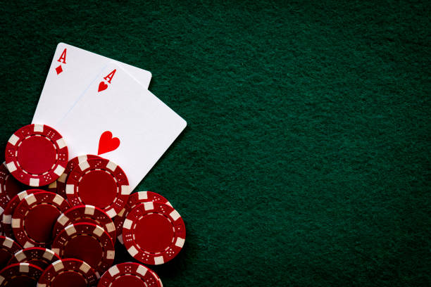 istock pair of ACEs and Red poker chips casino 959341582